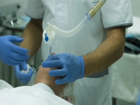 Performing surgery in operation room Video stock 81375653