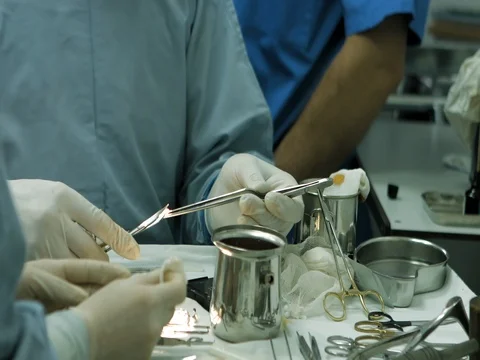 Performing surgery in operation room Video stock 81376728