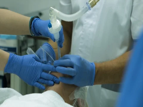 Performing surgery in operation room Video stock 81379253