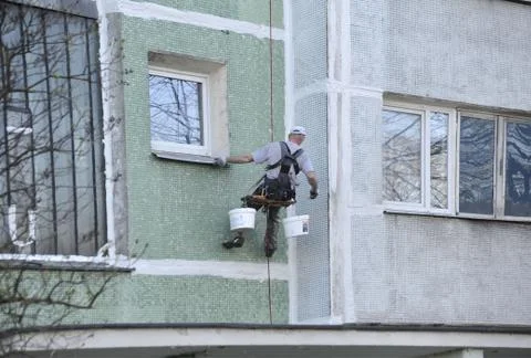 Performs a redecoration of the building. Stock Photos