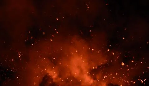 Perftect fire particles embers on background . Smoke fog misty texture overla Stock Photos