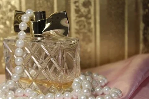 Perfume bottle on a beautiful background Stock Photos