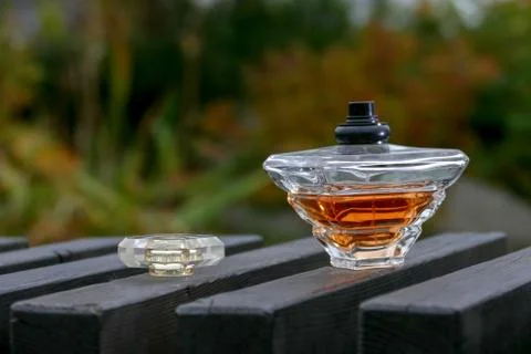 Perfume bottle on the bench Stock Photos