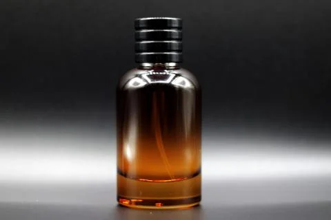 Perfume bottle with black background Stock Photos