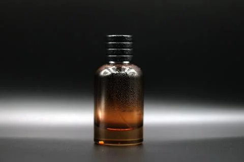 Perfume bottle with black background Stock Photos