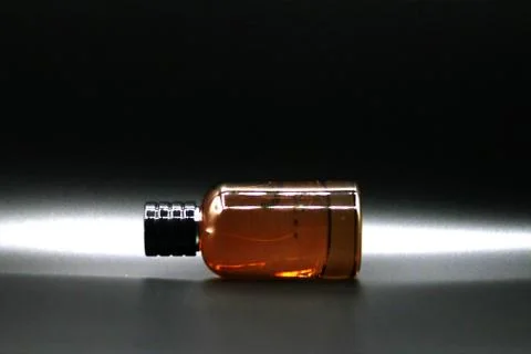 Perfume bottle with black background Stock Photos
