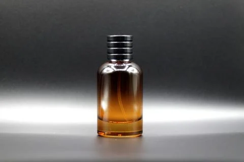 Perfume bottle with black background Stock Photos