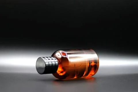 Perfume bottle with black background Stock Photos