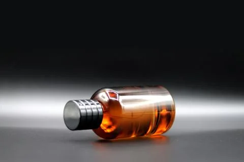 Perfume bottle with black background Stock Photos