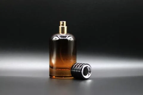 Perfume bottle with black background Stock Photos