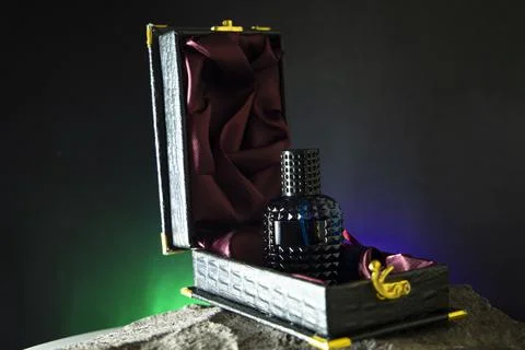 Perfume Bottle in black background Stock Photos