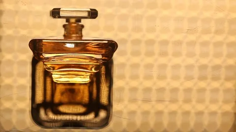 Perfume bottle with golden cap Stock Footage 70779828