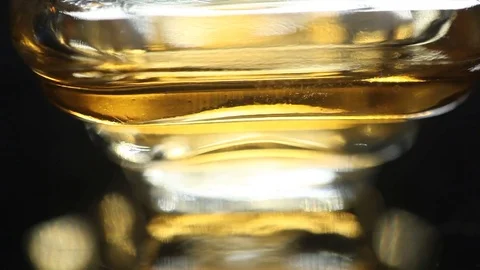 Perfume bottle with golden cap Stock Footage 70779872