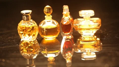 Perfume bottle with golden cap Stock Footage 70780121