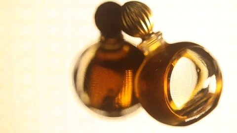Perfume bottle with golden cap Stock Footage 70781082