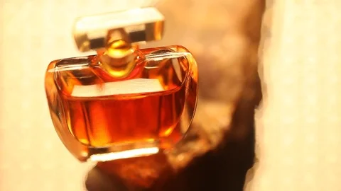 Perfume bottle with golden cap Stock Footage 70781110