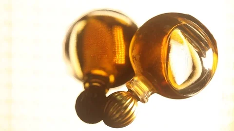 Perfume bottle with golden cap Stock Footage 70781264