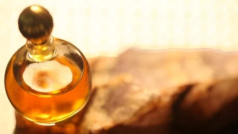 Perfume bottle with golden cap Stock Footage 70781571