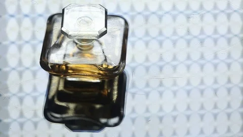 Perfume bottle with golden cap Stock Footage 70781589