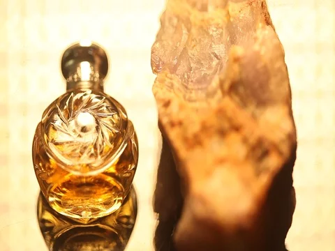 Perfume bottle with golden cap Stock Footage 70781679