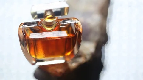 Perfume bottle with golden cap Stock Footage 70781921