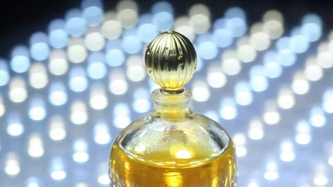 Perfume bottle with golden cap Stock Footage 70822650