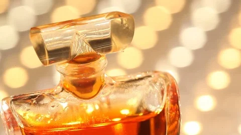 Perfume bottle with golden cap Stock Footage 70822730