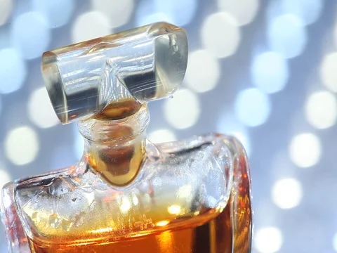 Perfume bottle with golden cap Stock Footage 70822796