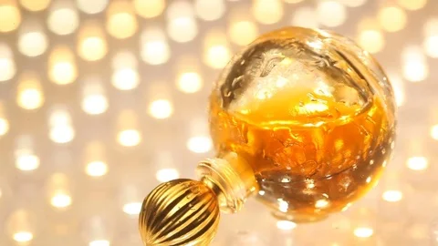 Perfume bottle with golden cap Stock Footage 70822847