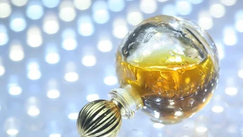Perfume bottle with golden cap Stock Footage 70822867