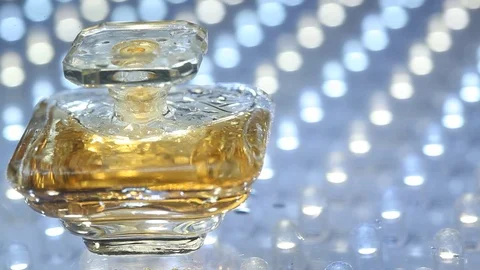 Perfume bottle with golden cap Stock Footage 70822875