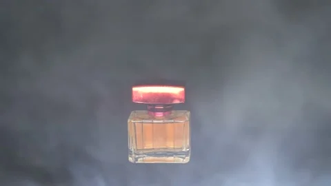 Perfume bottle isolated with black background. Add smoke effect for cinematic. Stock Footage 164153425