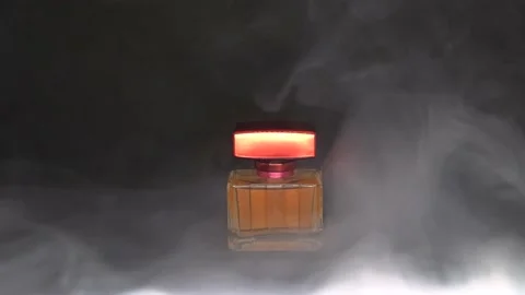 Perfume bottle isolated with black background. Add smoke effect for cinematic. Stock Footage 164153463