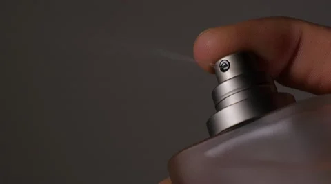 Perfume bottle spray in the dark 4K 2160p UHD footage - Parfum spraying by th Video stock 50388710