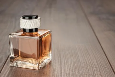 Perfume bottle on the table Stock Photos