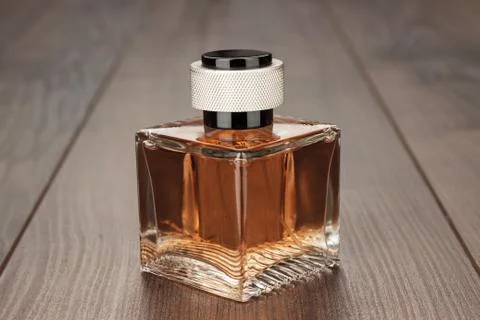 Perfume bottle on the table Stock Photos