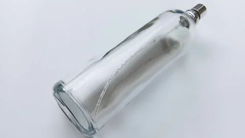 Perfume bottle on white background. Stock Footage 292957396