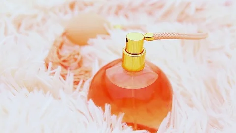 Perfume bottle white background fur Stock Footage 84120967