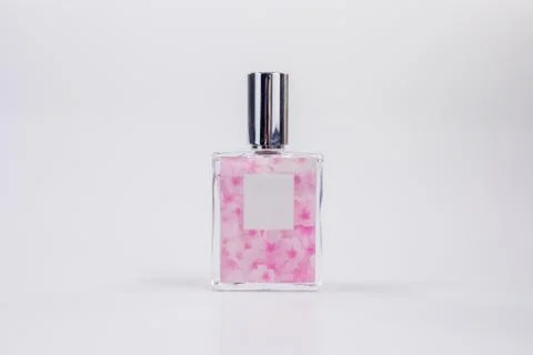 Perfume bottle on white background. Stock Photos