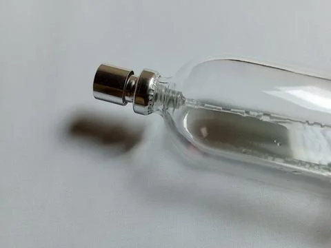 Perfume bottle on white background. Фото