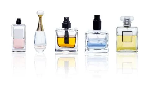 Perfume bottles premium collection isolated white background reflection Stock Photos