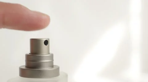 Perfume elegant  bottle sprayer pushing while camera tilting 4K 3840X2160 Ult Vídeo Stock 51558251