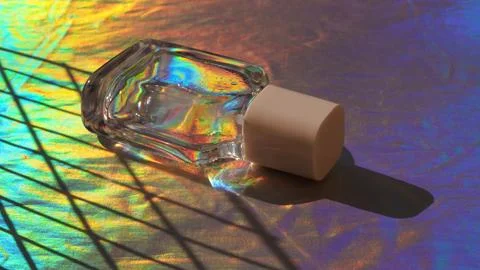 Perfume glass bottle on silver table. Perfume and toilet water. Stock Photos