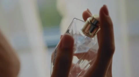Perfume in the hands of the bride. Close-up Stock Footage