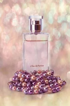 Perfume in the jar on a beautiful background Stock Photos