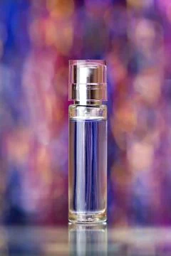 Perfume in the jar on a beautiful background 库存照片