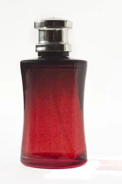Perfume in red bottle Stock Photos