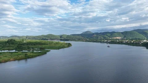 Perfume River flowing through green mountains near Hue 4K Stock Footage 339862943