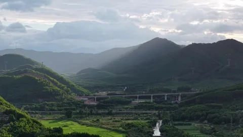 Perfume River with misty mountain range aerial panorama 4K Stock Footage 339863340