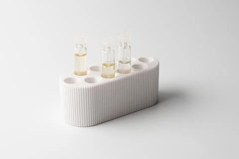 Perfume samples on white background Stock Photos